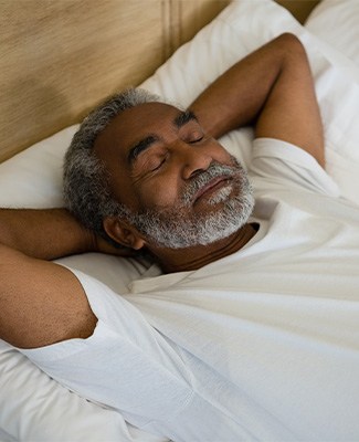 Man sleeping in bed